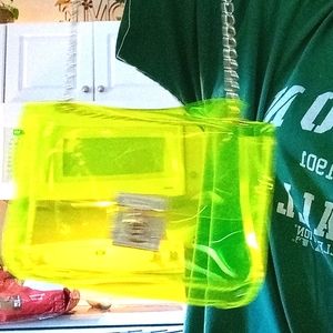 A yellow-green translucent purse (unused)